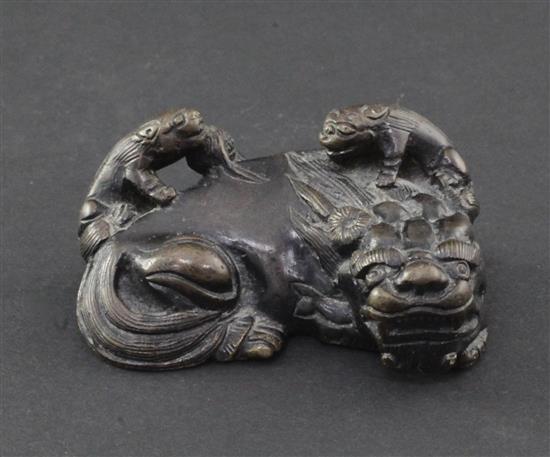 A Chinese bronze scroll weight, 19th century, 6cm.
